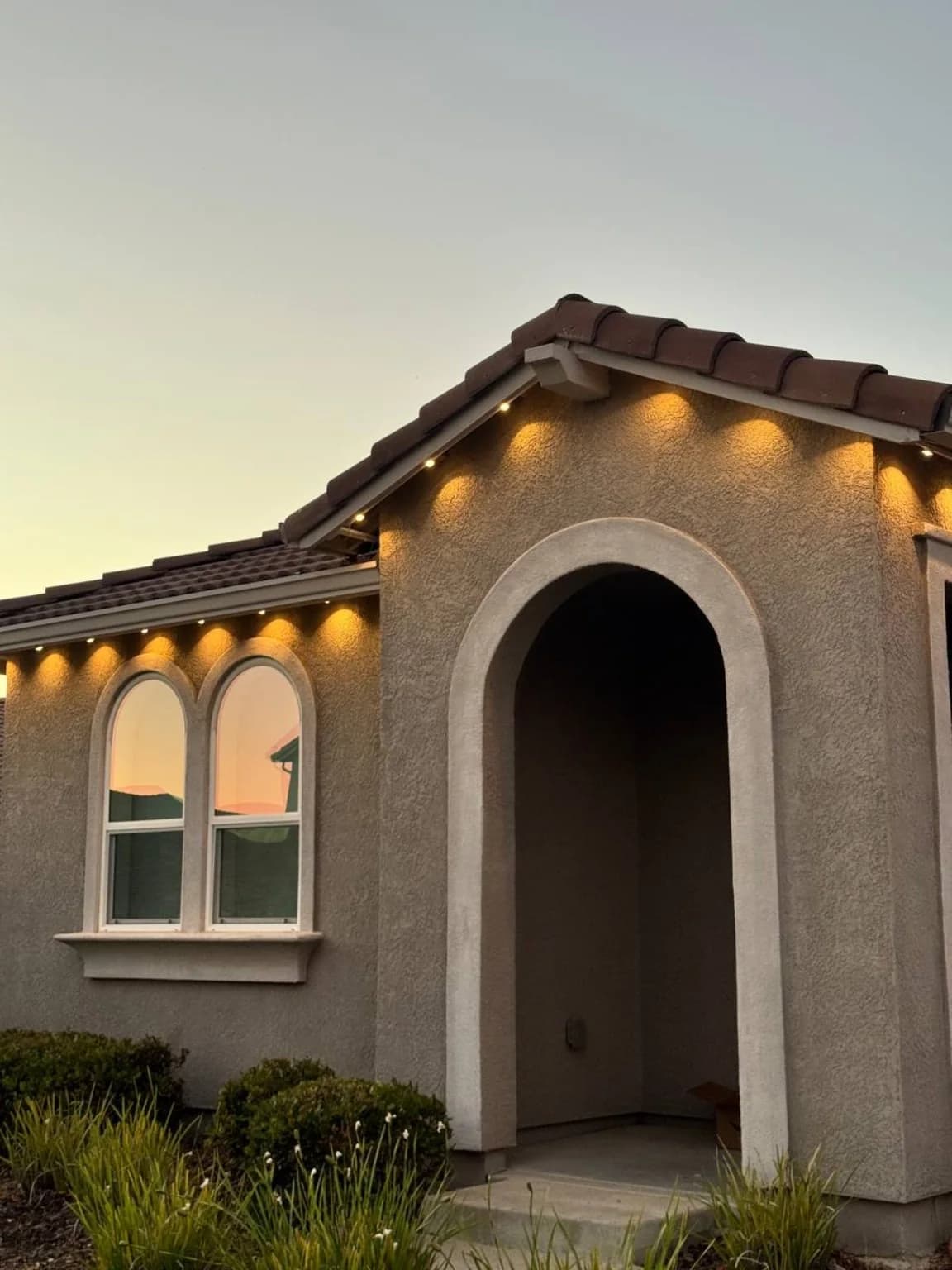 Warm roofline lighting installed by SWFL Permanent Lighting