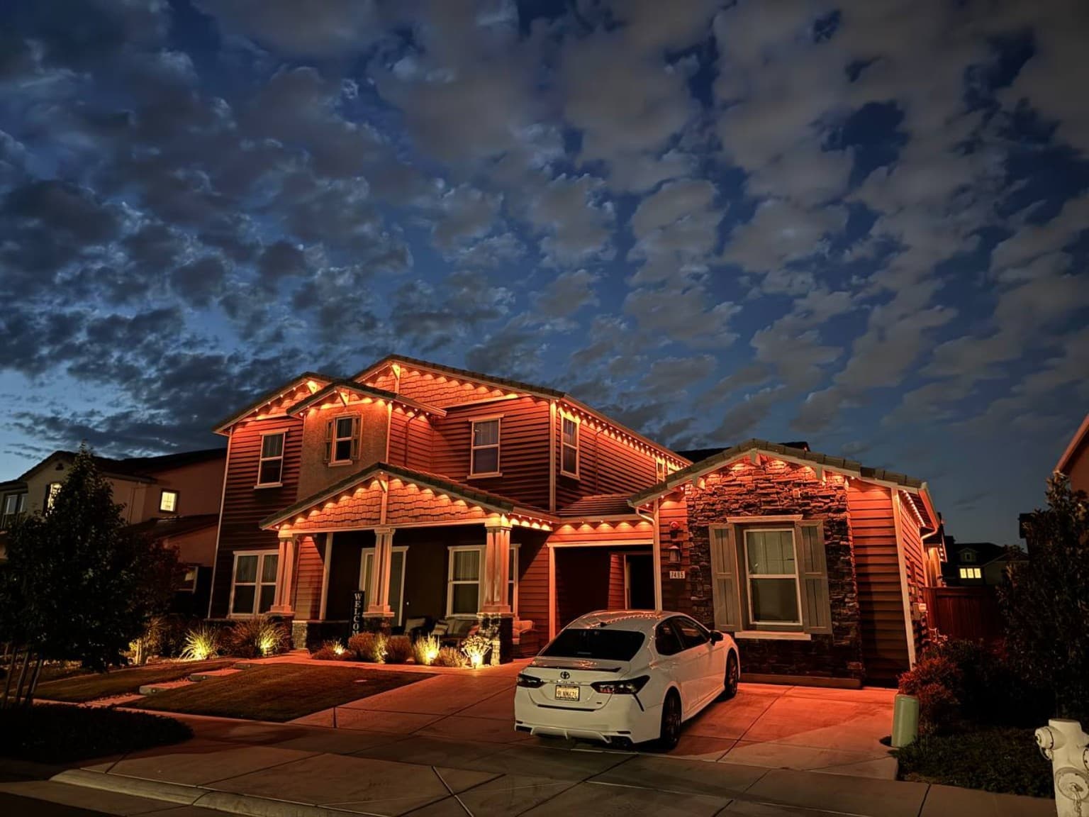 Wide amber roofline installed by SWFL Permanent Lighting