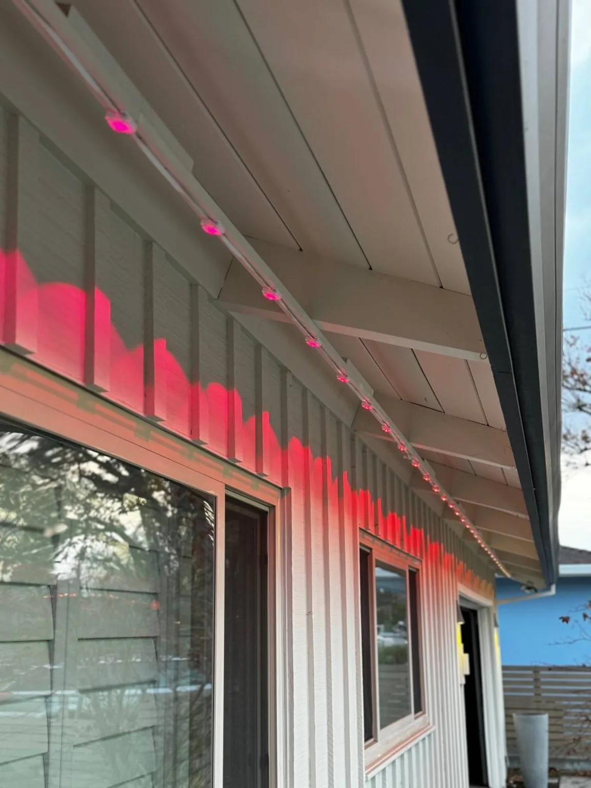 Permanent light placement under a roofline